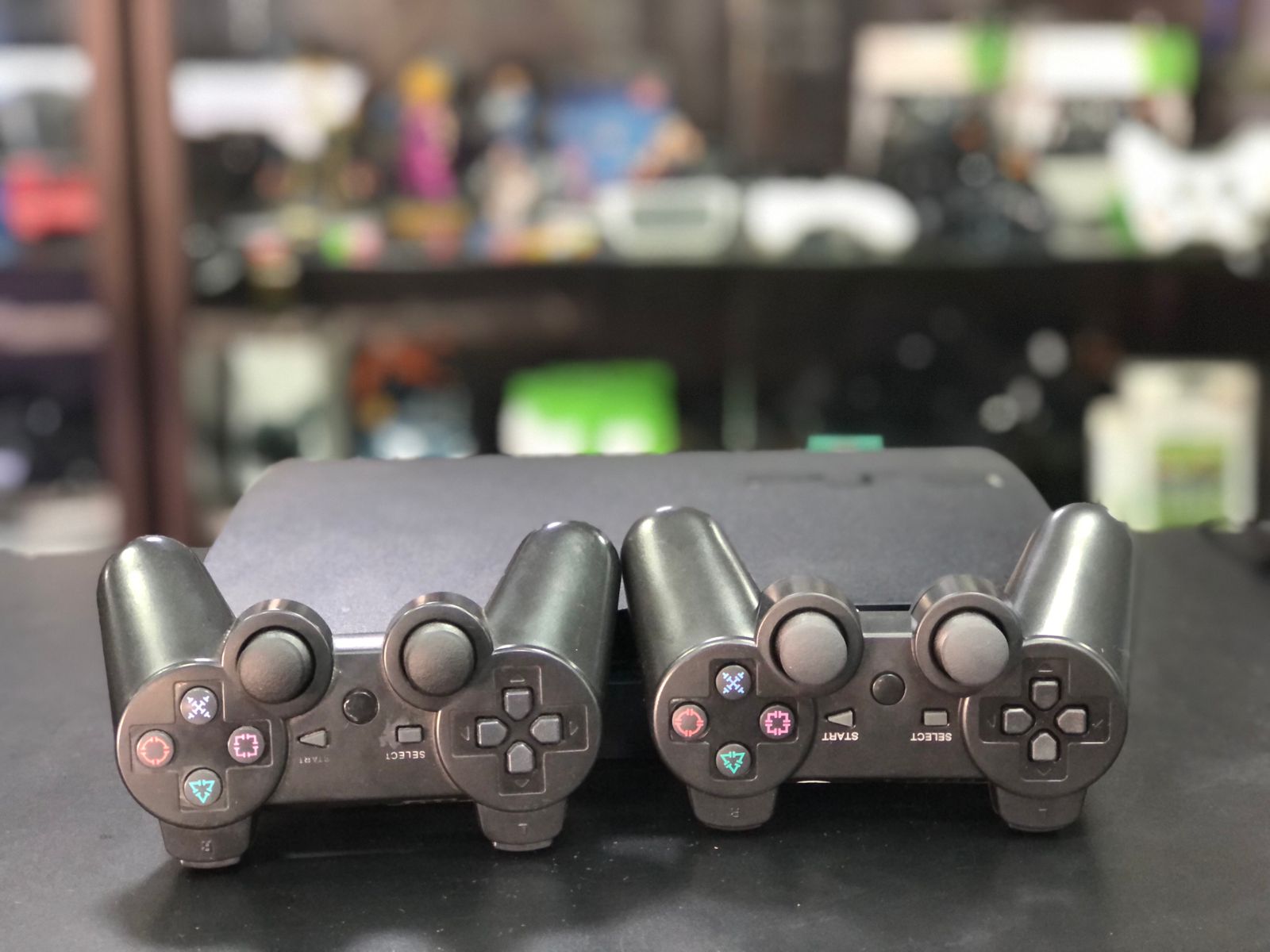 Playstation 3 Slim 750gb Sistema H.e.n + 2 Controles S/Fio Paralelo + Jogos - Item Usado