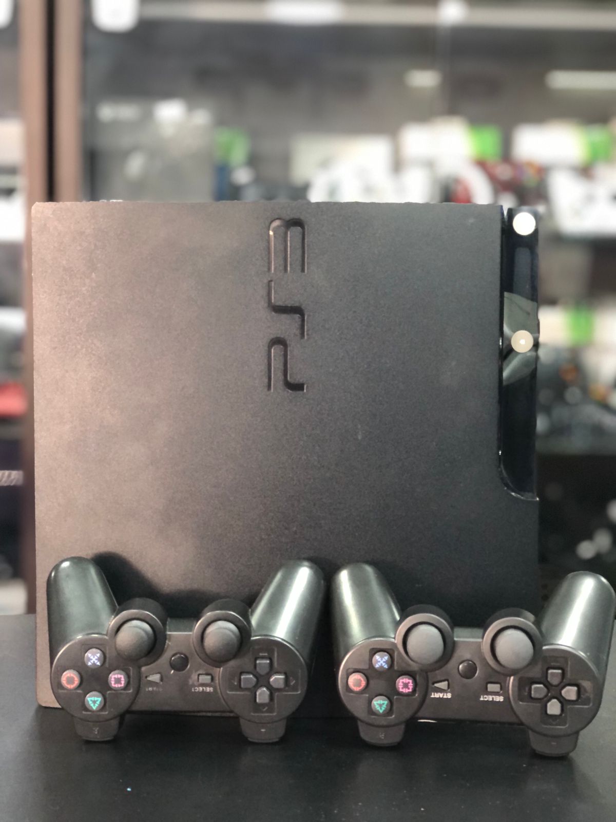 Playstation 3 Slim 750gb Sistema H.e.n + 2 Controles S/Fio Paralelo + Jogos - Item Usado