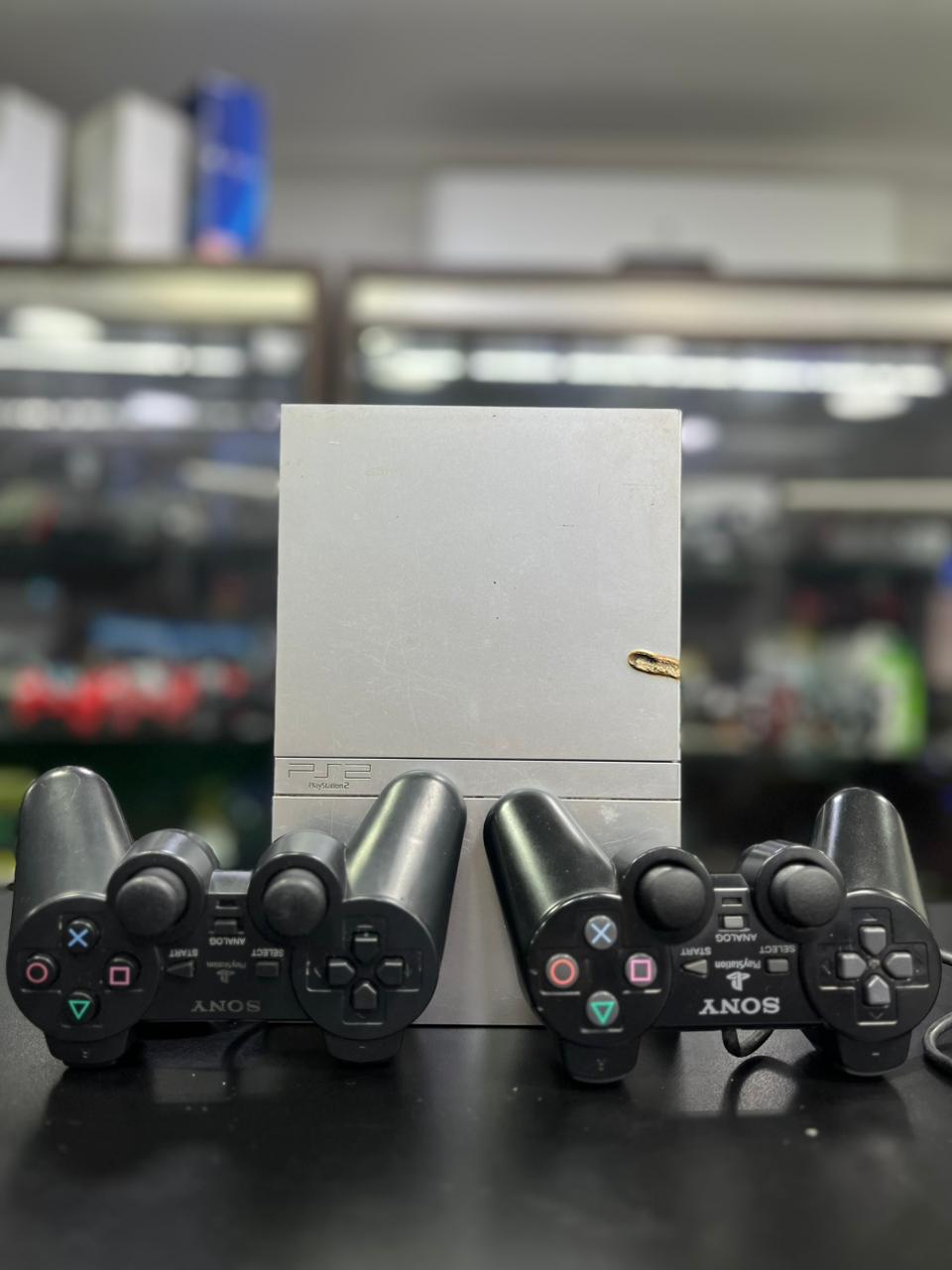 PlayStation 2 Slim Prata + 2 Controles + Jogos + HDMI | Revisado