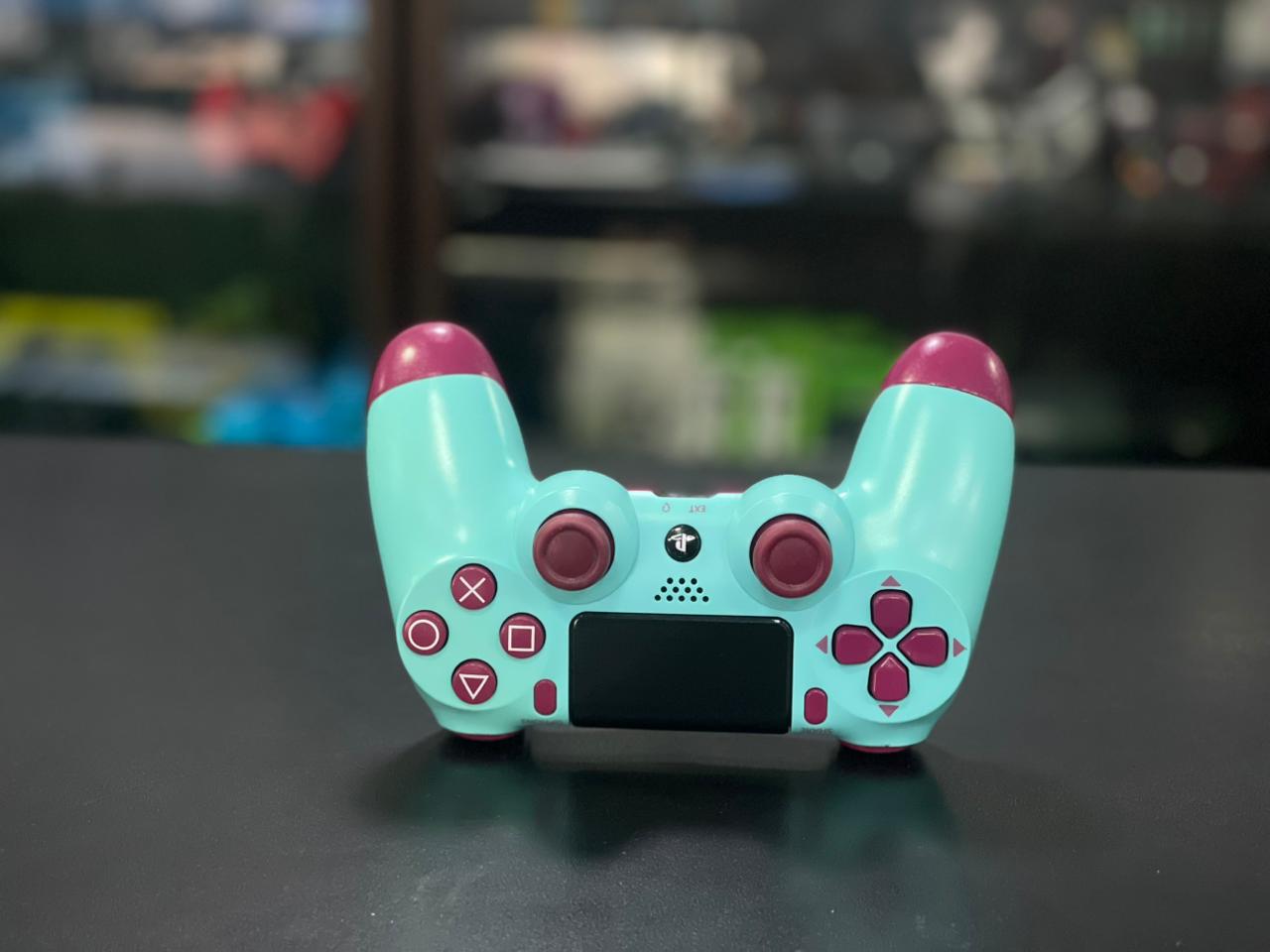 Controle PlayStation 4 sem fio verde e roxo primeira linha