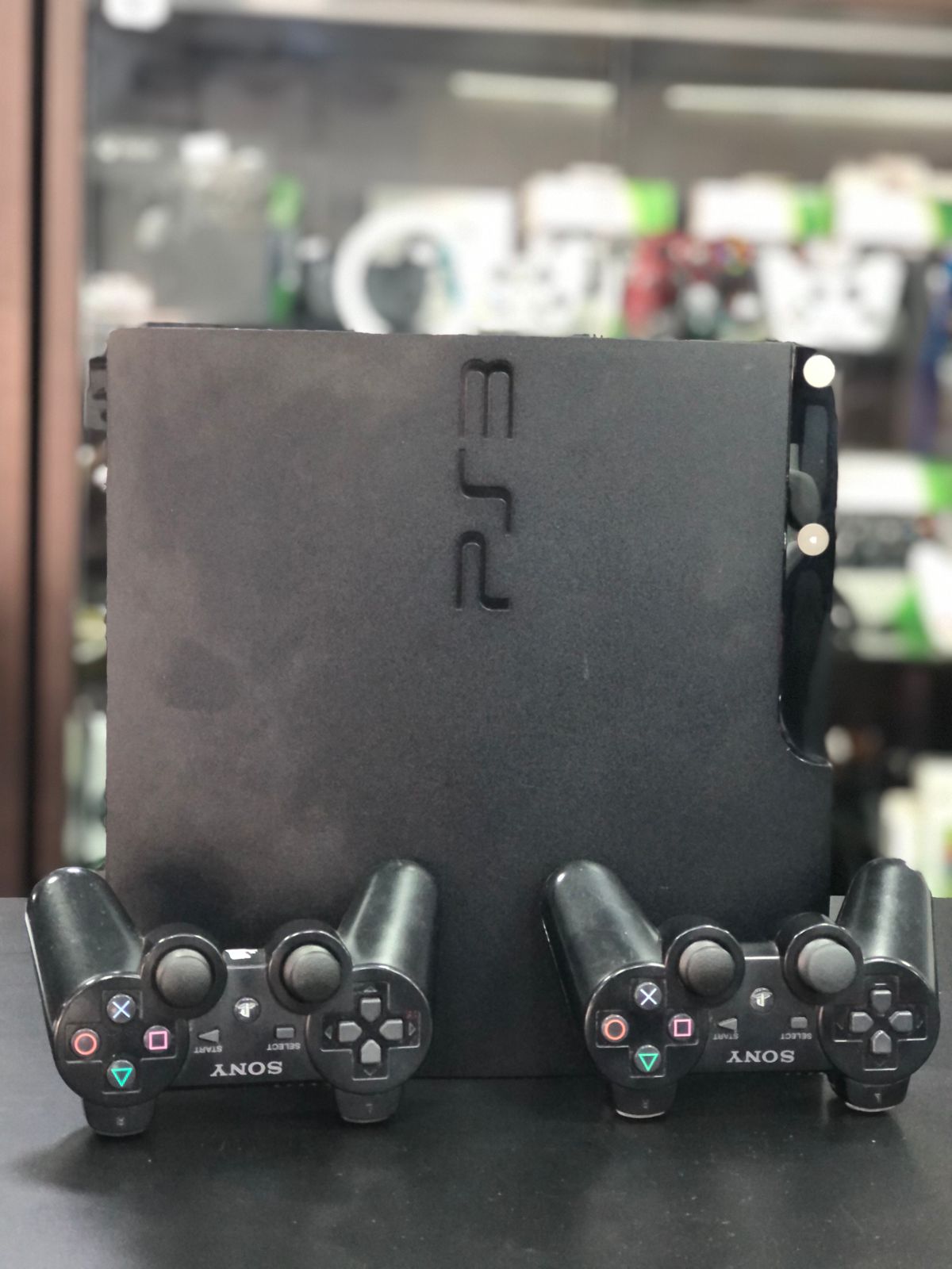 Playstation 3 Slim 750gb Sistema H.e.n + 2 Controle S/Fio originais + Jogos - Item Usado