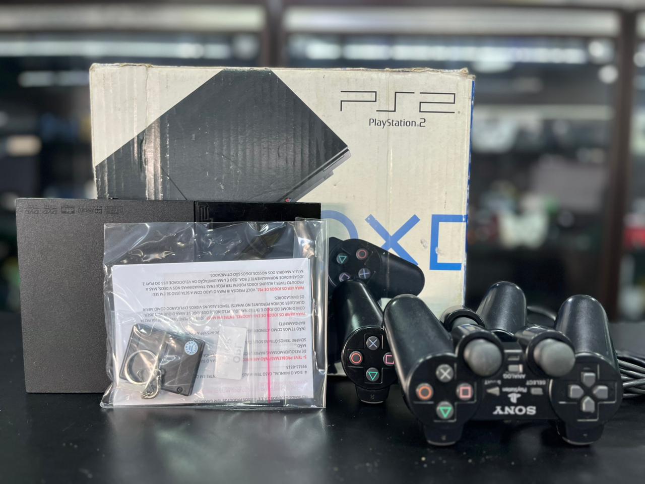 PLAYSTATION 2 SLIM O.P.L 64GB + 02 CONTROLES ORIGINAIS + 02 MEMORY CARDS + HDMI + JOGOS + CAIXA  PRONTO PARA JOGAR
