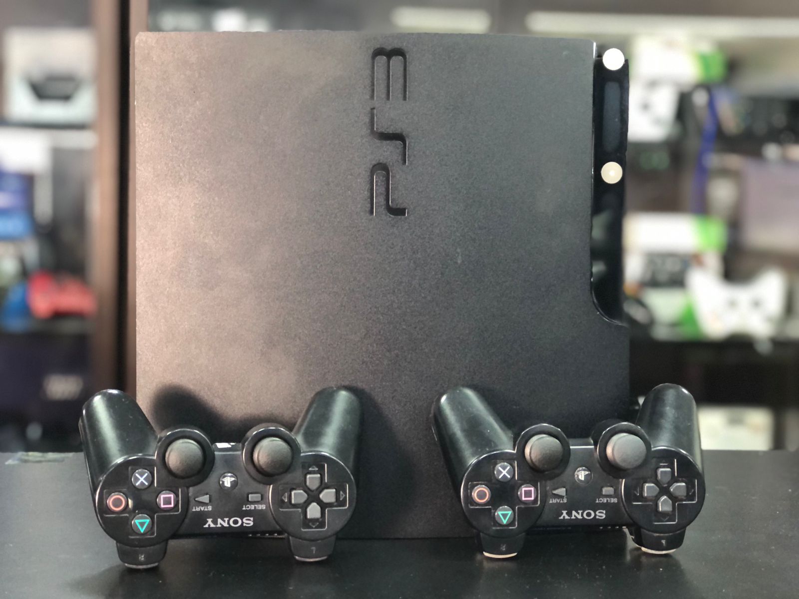 Playstation 3 Slim 750gb Sistema H.e.n + 2 Controle S/Fio originais + Jogos - Item Usado